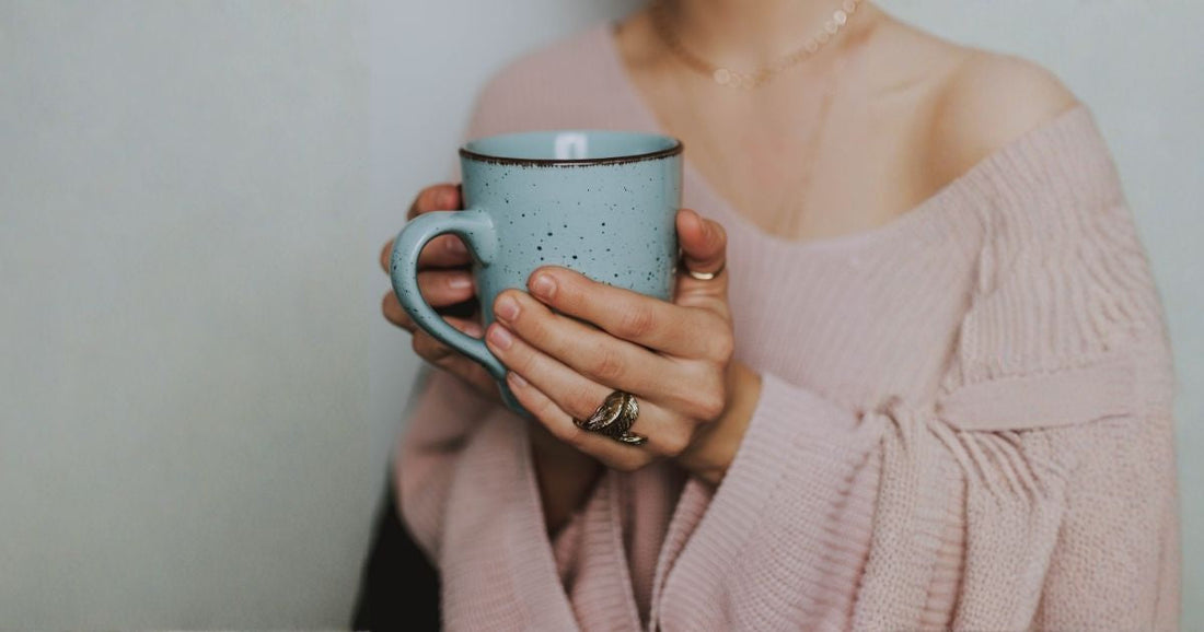 woman holding mug