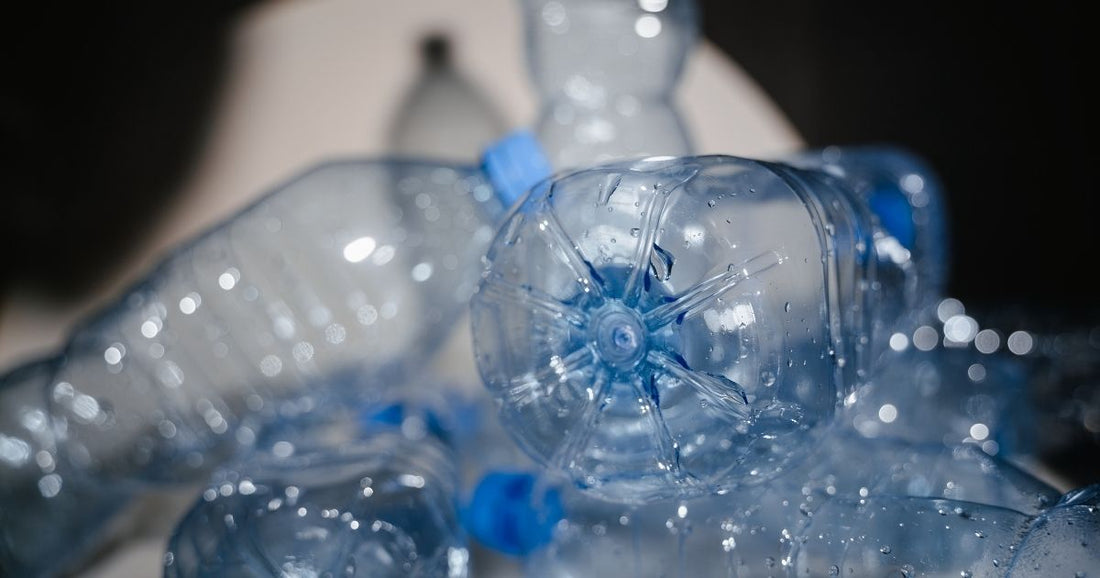 Plastic bottles being back to the environment compared to reusable Just Water bottles